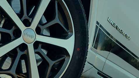 Wheel close-up of a Jeep Meridian