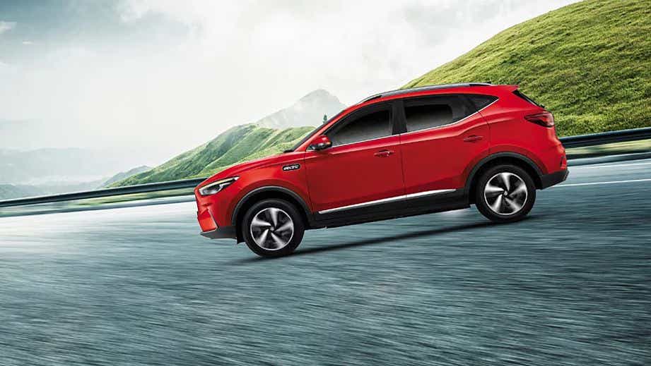 side view of a Glaze Red MG ZS EV