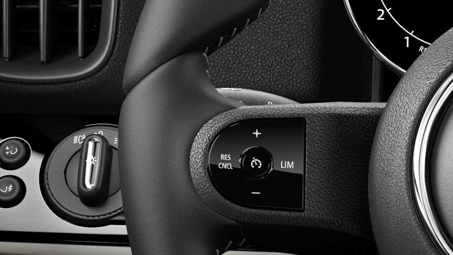Close-up of the steering wheel controls of a Mini 3 DOOR