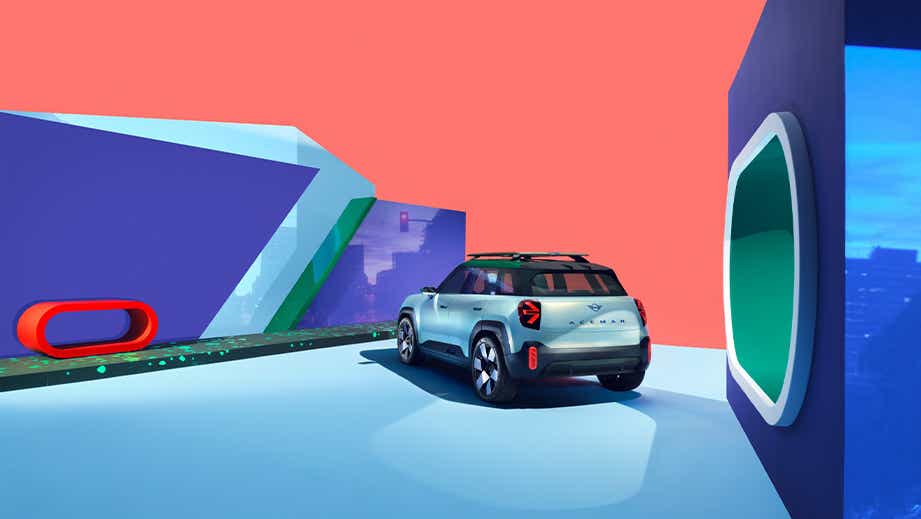 Rear three-quarter view of a Light Blue Mini Aceman