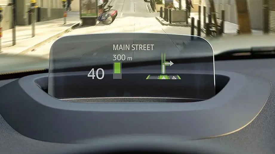 Interior dashboard view of a Mini Cooper Countryman with navigation display