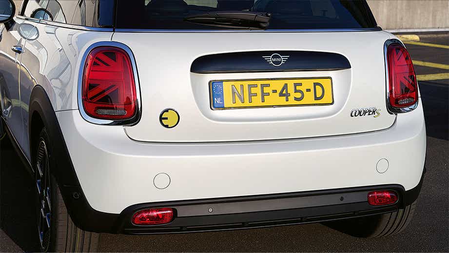 Rear view of a Nanuq White Mini Cooper SE
