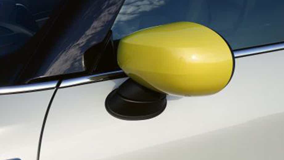 Side mirror close-up of a Mini Cooper SE