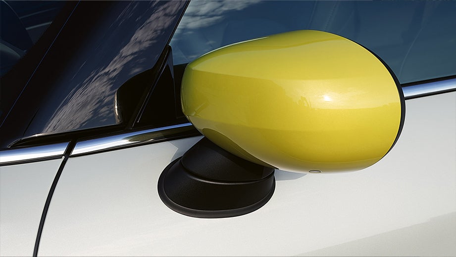 Side mirror close-up of a Mini Cooper SE