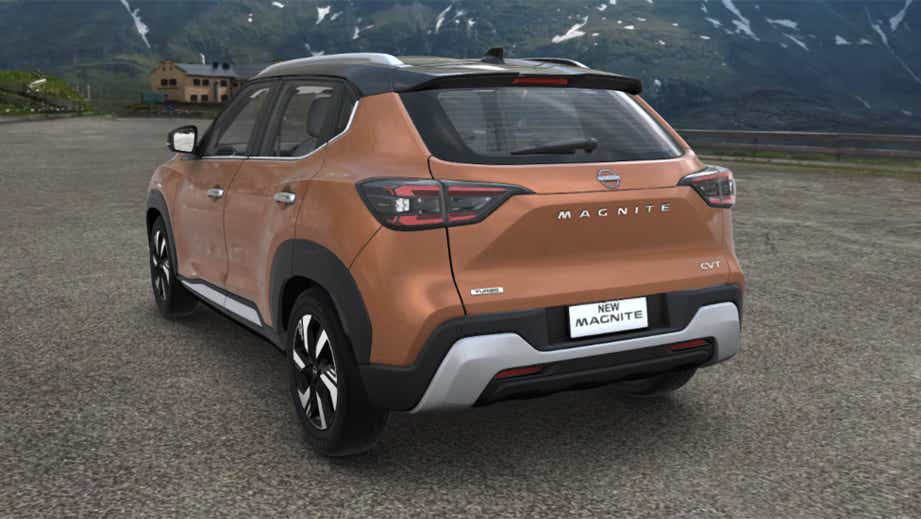 rear three-quarter of a Sunrise Copper Orange Nissan Magnite