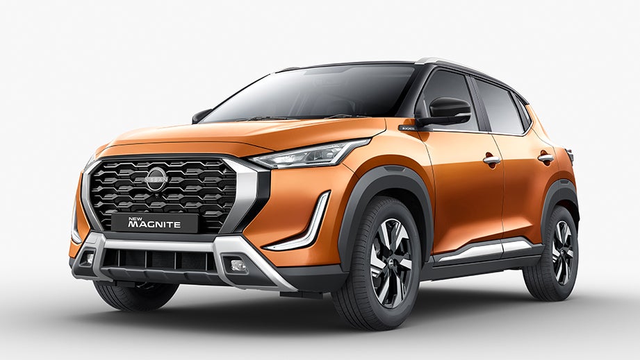 front three-quarter of a Sunrise Copper Orange Nissan Magnite