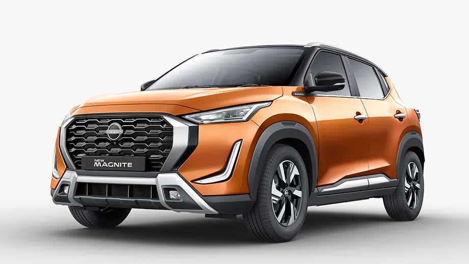 front three-quarter of a Sunrise Copper Orange Nissan Magnite