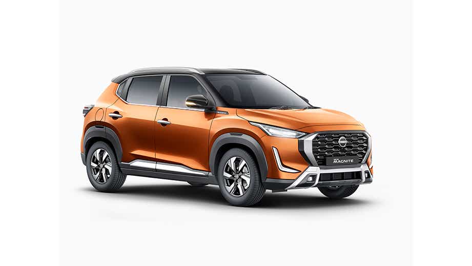 front three-quarter view of a Sunrise Copper Orange Nissan Magnite