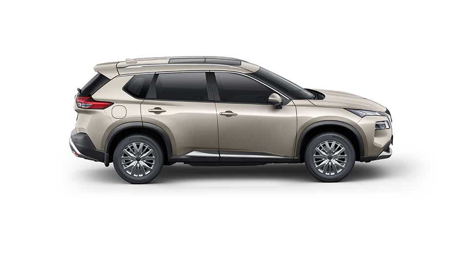 side view of a Champagne Silver Nissan X-Trail