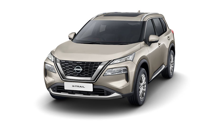 front three-quarter view of a Champagne Silver Nissan X-Trail
