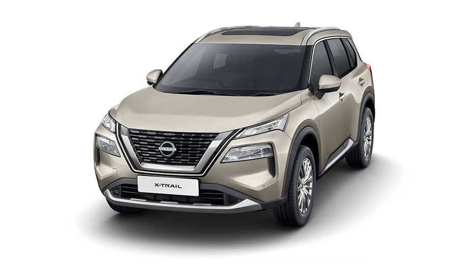 front three-quarter view of a Champagne Silver Nissan X-Trail