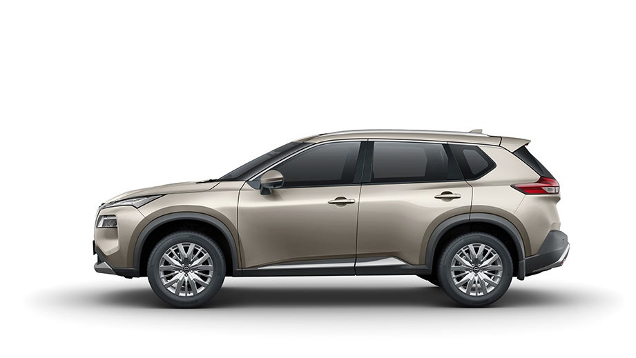 side view of a Champagne Silver Nissan X-Trail