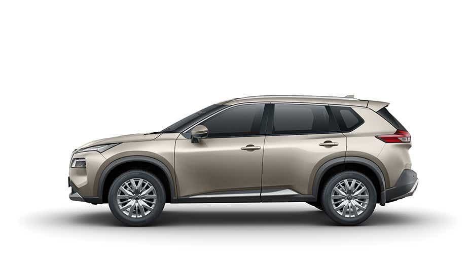 side view of a Champagne Silver Nissan X-Trail