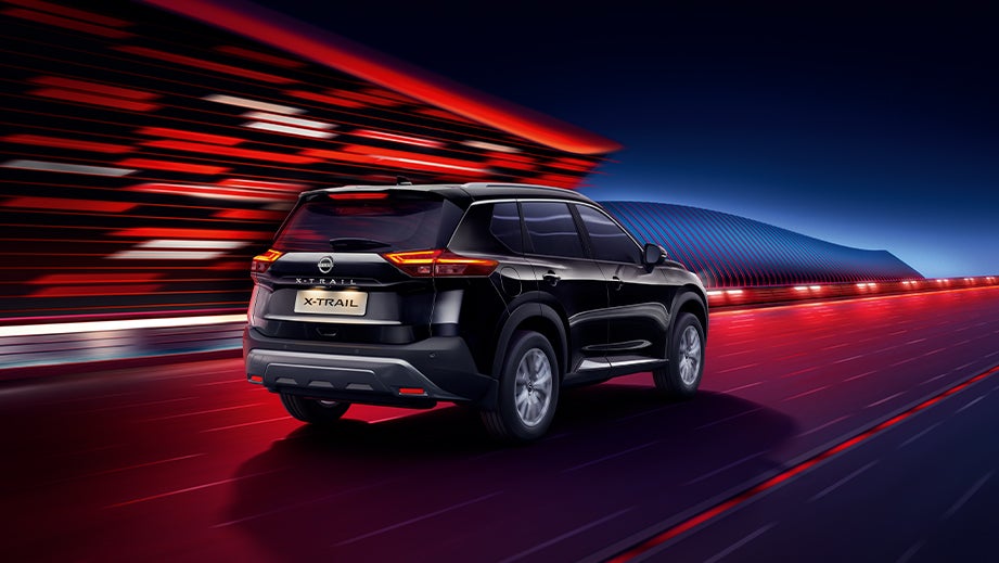 Rear three-quarter view of a Diamond Black Nissan X-Trail