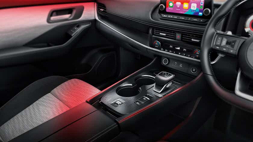 Interior dashboard and center console of a Nissan X-Trail