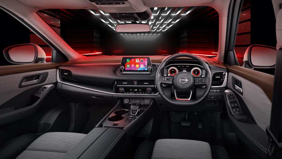 dashboard and steering wheel of a Nissan X-Trail