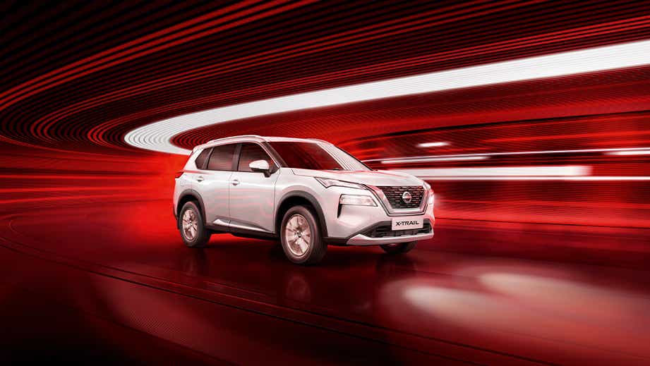 front three-quarter view of a Pearl White Nissan X-Trail