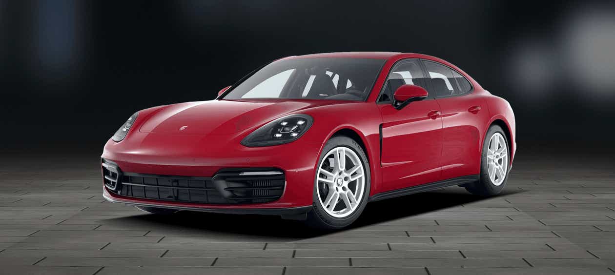 front three-quarter view of a Carmine Red Porsche Panamera 2021-2023