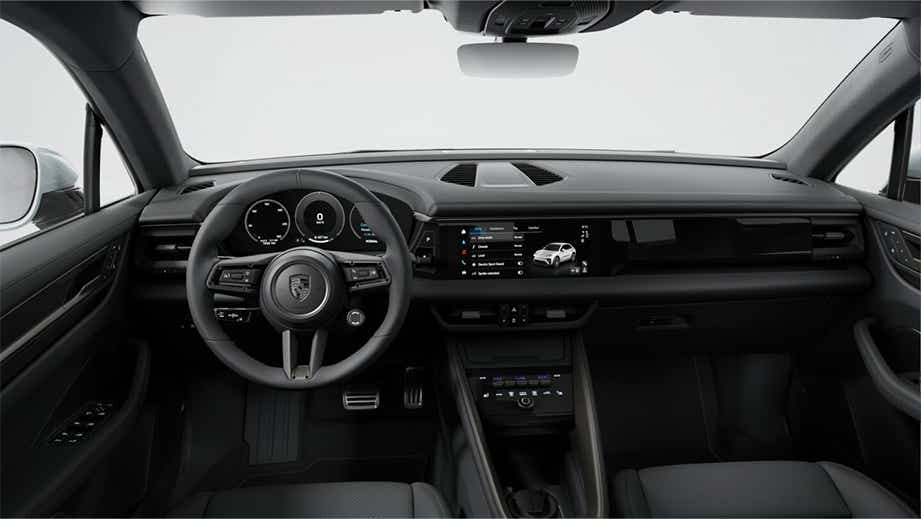 Interior dashboard view of a Porsche Macan EV