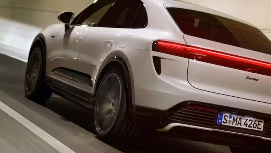 rear three-quarter of a White Porsche Macan EV
