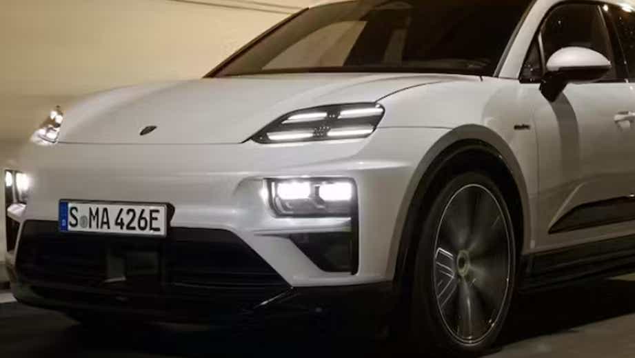 Front three-quarter view of a White Porsche Macan EV