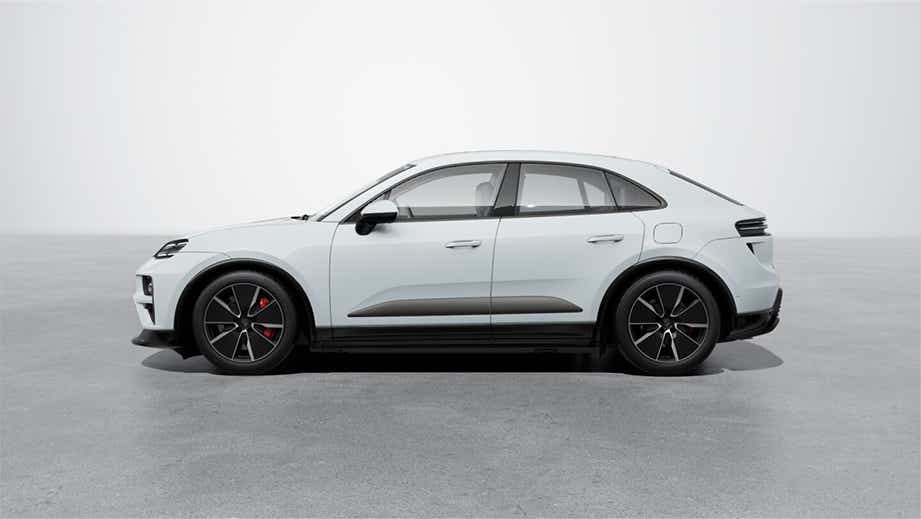 side view of a White Porsche Macan EV