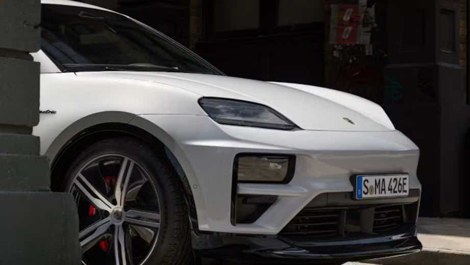 Front view of a White Porsche Macan EV