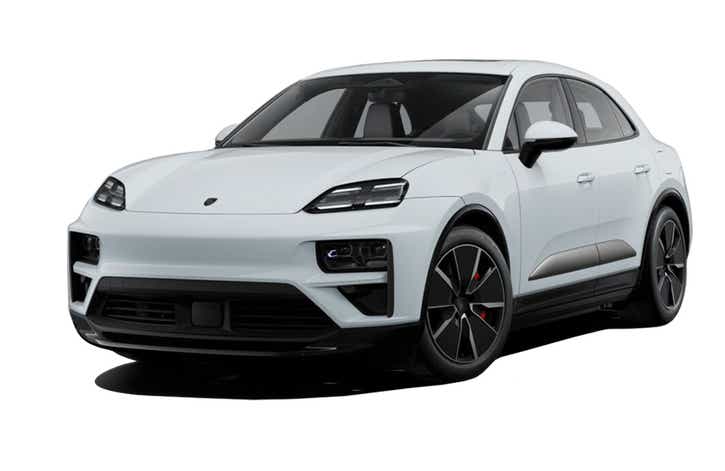 front three-quarter view of a White Porsche Macan EV