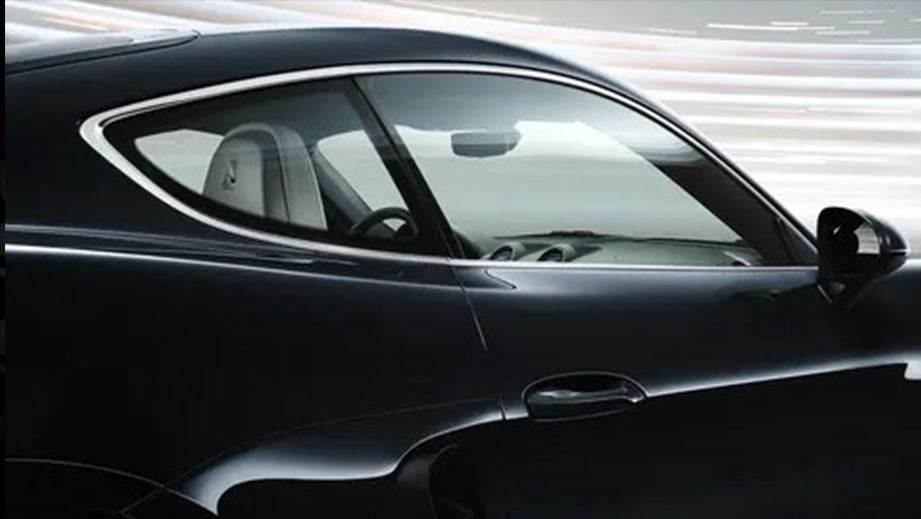 Side view of a Porsche 718 coupe