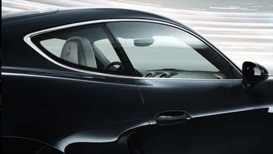 Side view of a Porsche 718 coupe