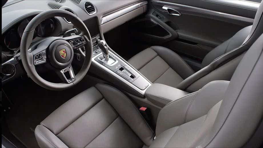 interior front seats and dashboard of a Porsche 718