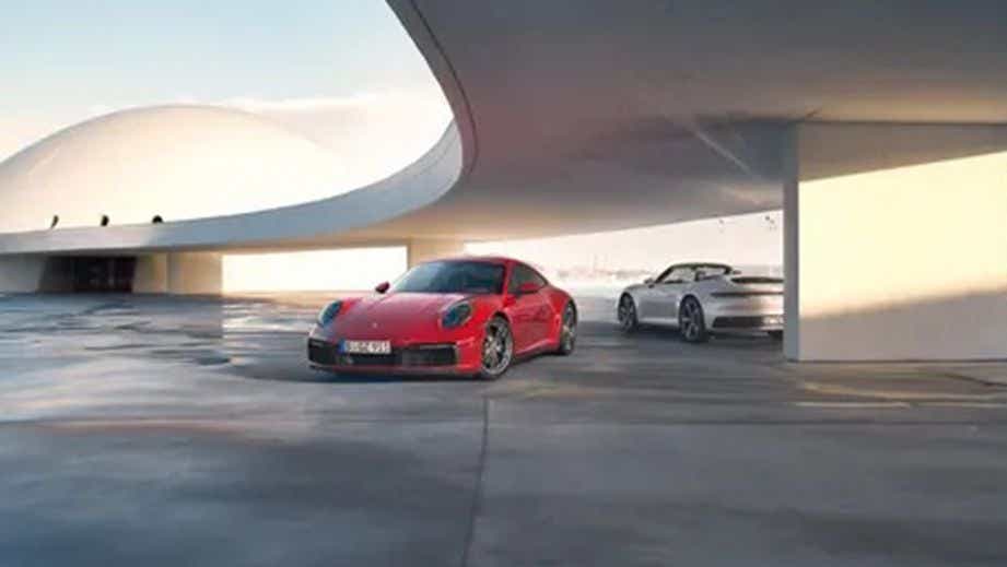 full-car view of a Guards Red Porsche 911
