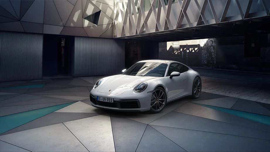 Front three-quarter view of a White Porsche 911