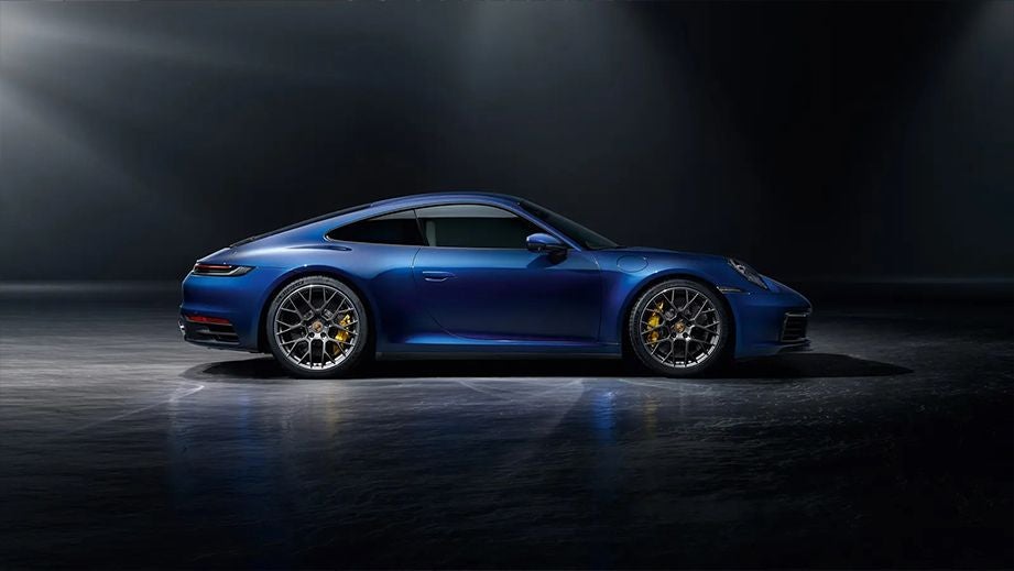 side view of a Gentian Blue Metallic Porsche 911