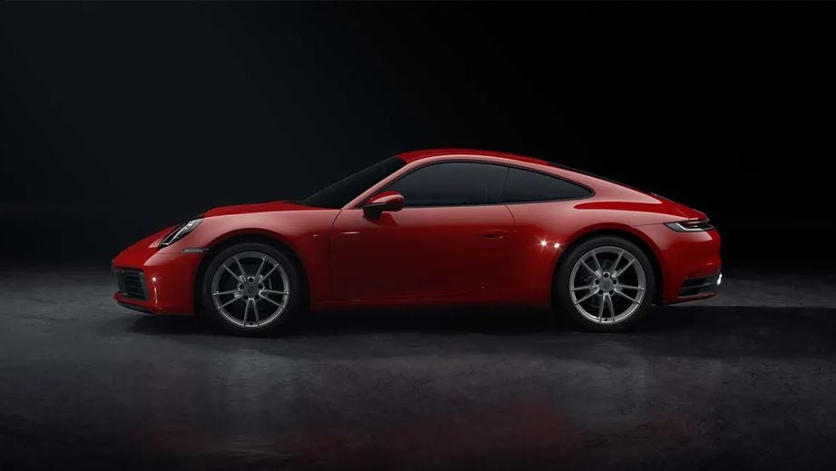 side view of a Guards Red Porsche 911