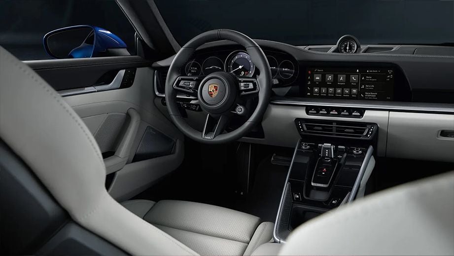 Interior dashboard view of a Porsche 911