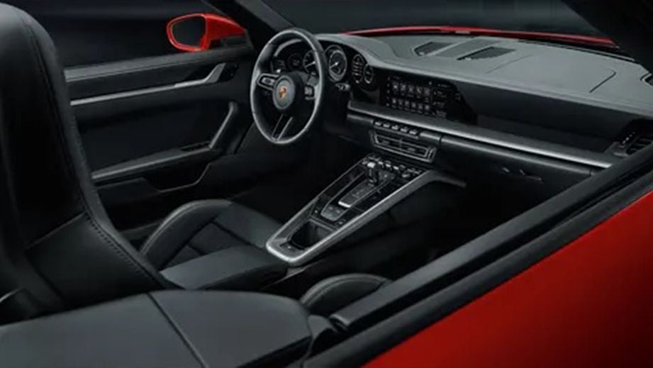 Interior dashboard view of a Porsche 911