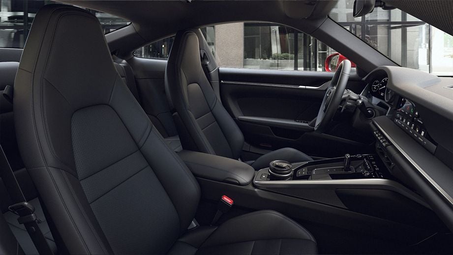 interior front seats and dashboard of a Porsche 911