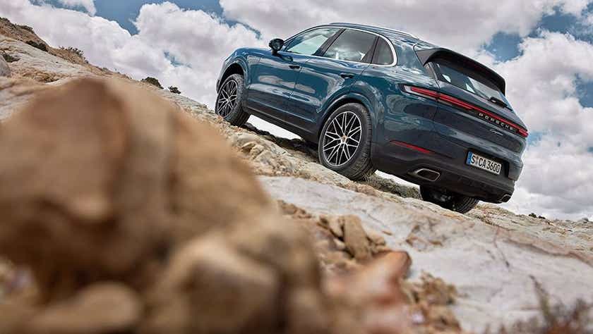 rear three-quarter view of a Porsche Cayenne