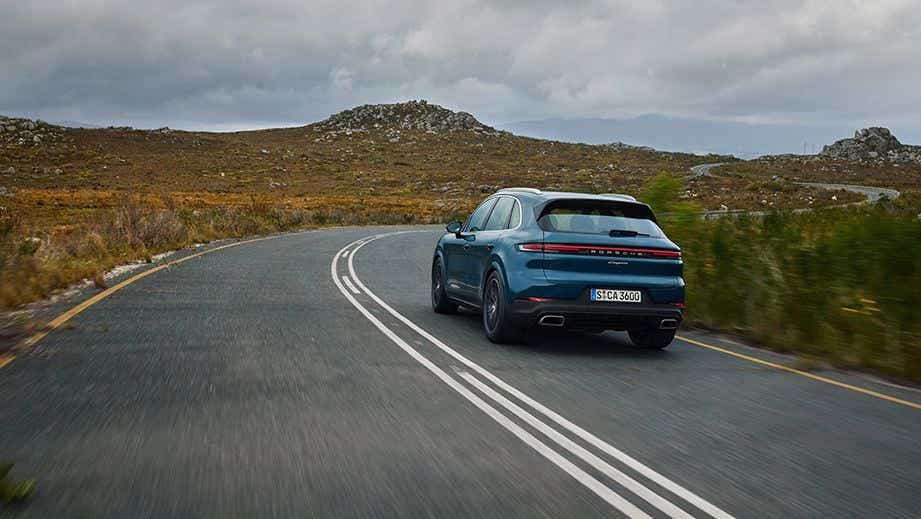 rear three-quarter view of a Porsche Cayenne