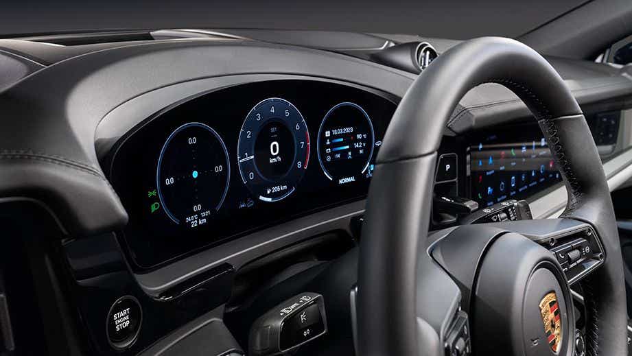 Dashboard and steering wheel view of a Porsche Cayenne