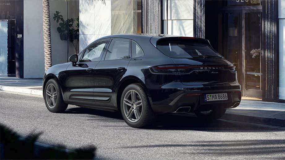 rear three-quarter of a Black Porsche Macan