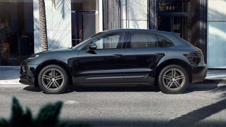 side profile of a Black Porsche Macan
