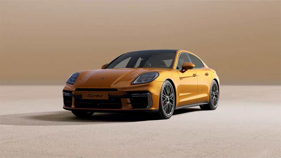 front three-quarter view of a Madeira Gold Metallic Porsche Panamera