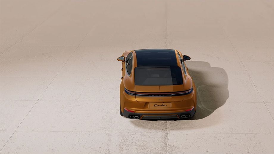 rear view of a Madeira Gold Metallic Porsche Panamera