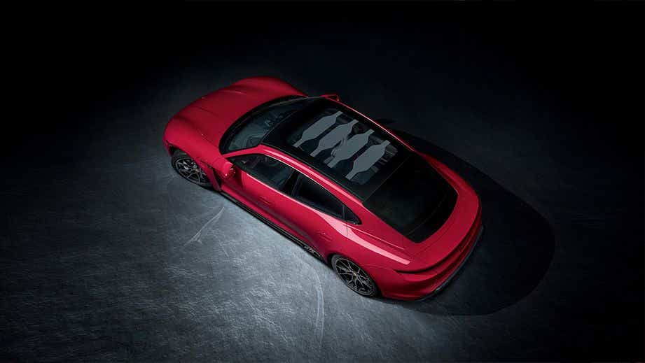 high-angle view of a Carmine Red Porsche Taycan