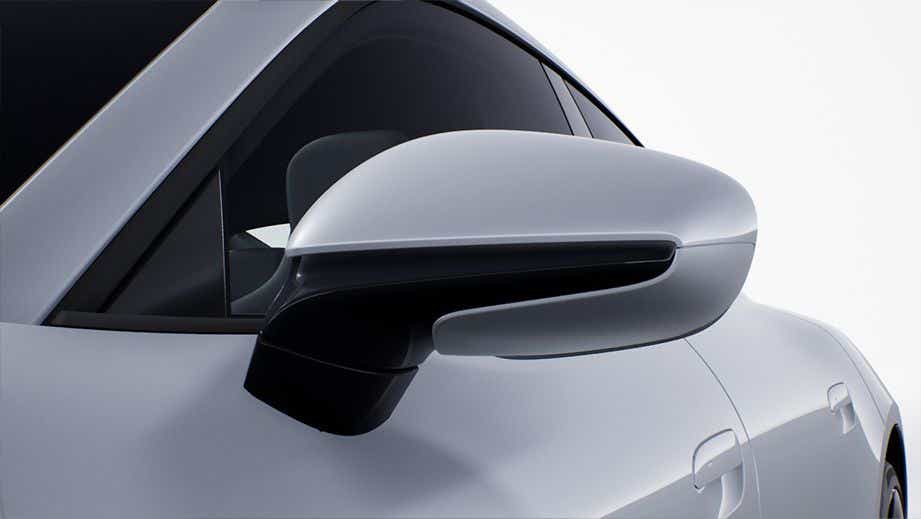 Side mirror close-up of a Porsche Taycan