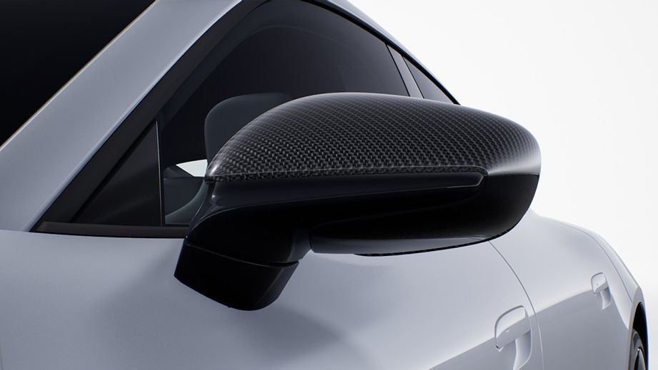 Side mirror close-up of a Porsche Taycan