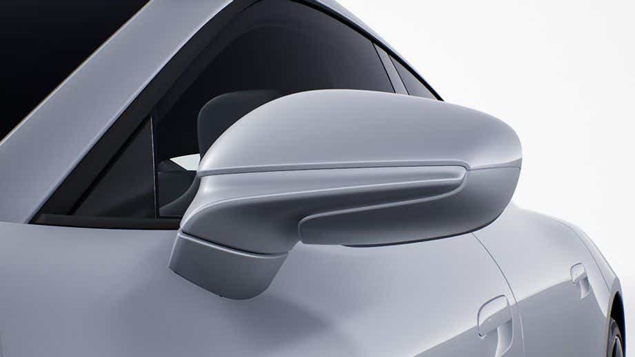 Side mirror close-up of a Porsche Taycan