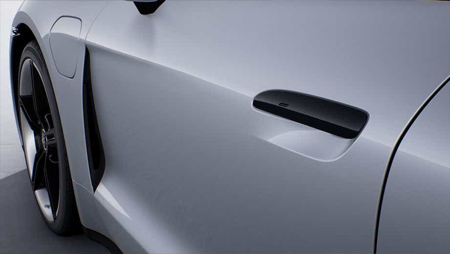 close-up of door handle and wheel on a Porsche Taycan